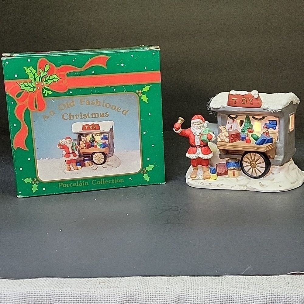 Russ Old Fashioned Christmas Porcelain Collection Electric santa/wagon.‎